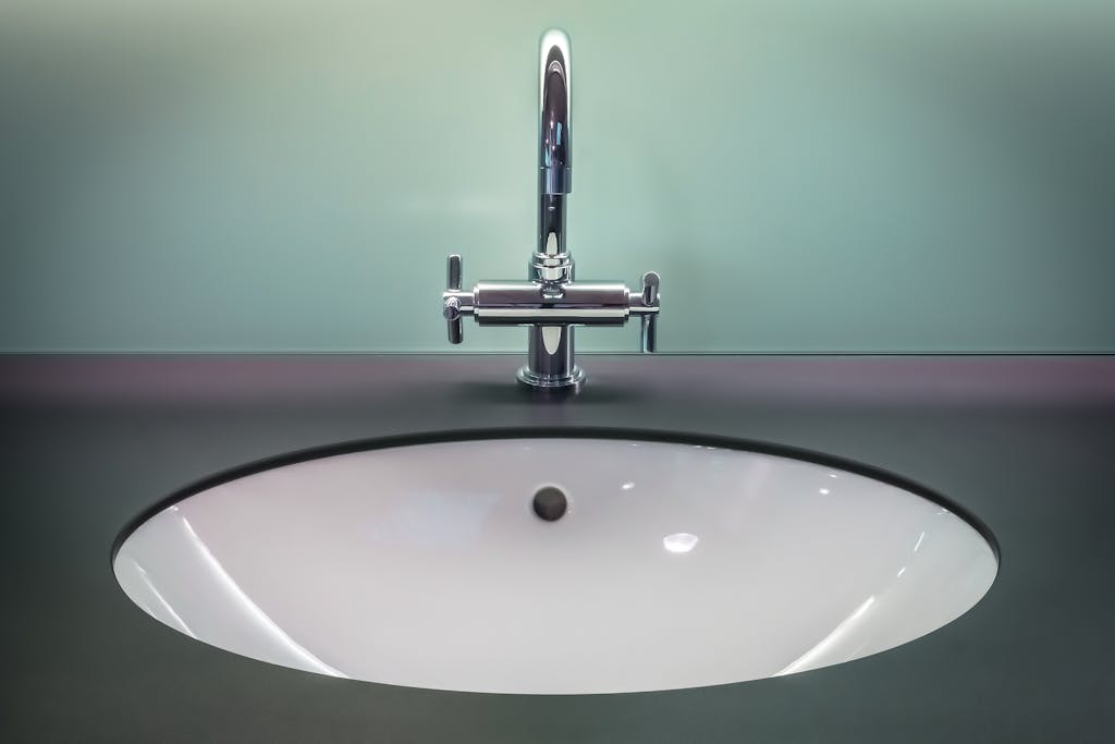 Black and White Vanity Top With Stainless Steel Faucet